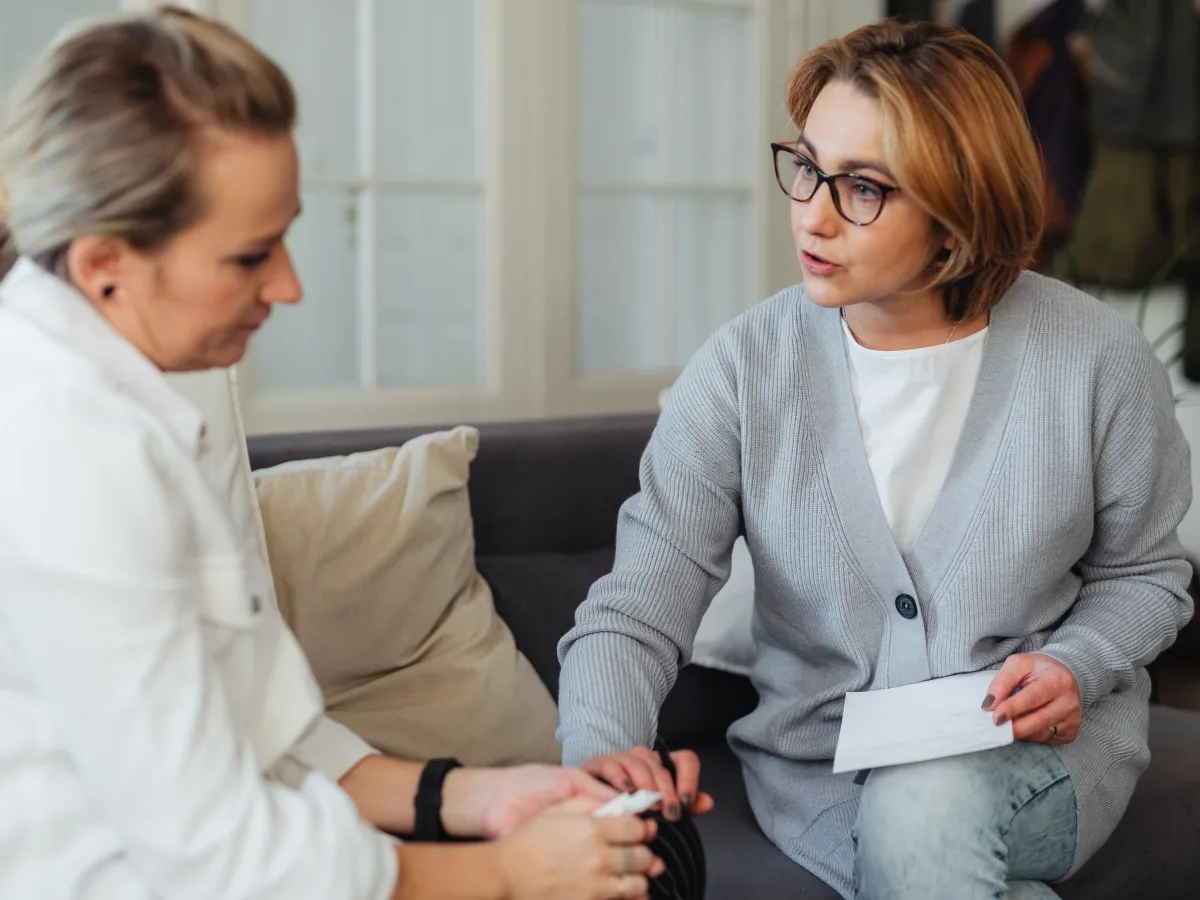 Care professional discussing a personalized care plan during a home visit